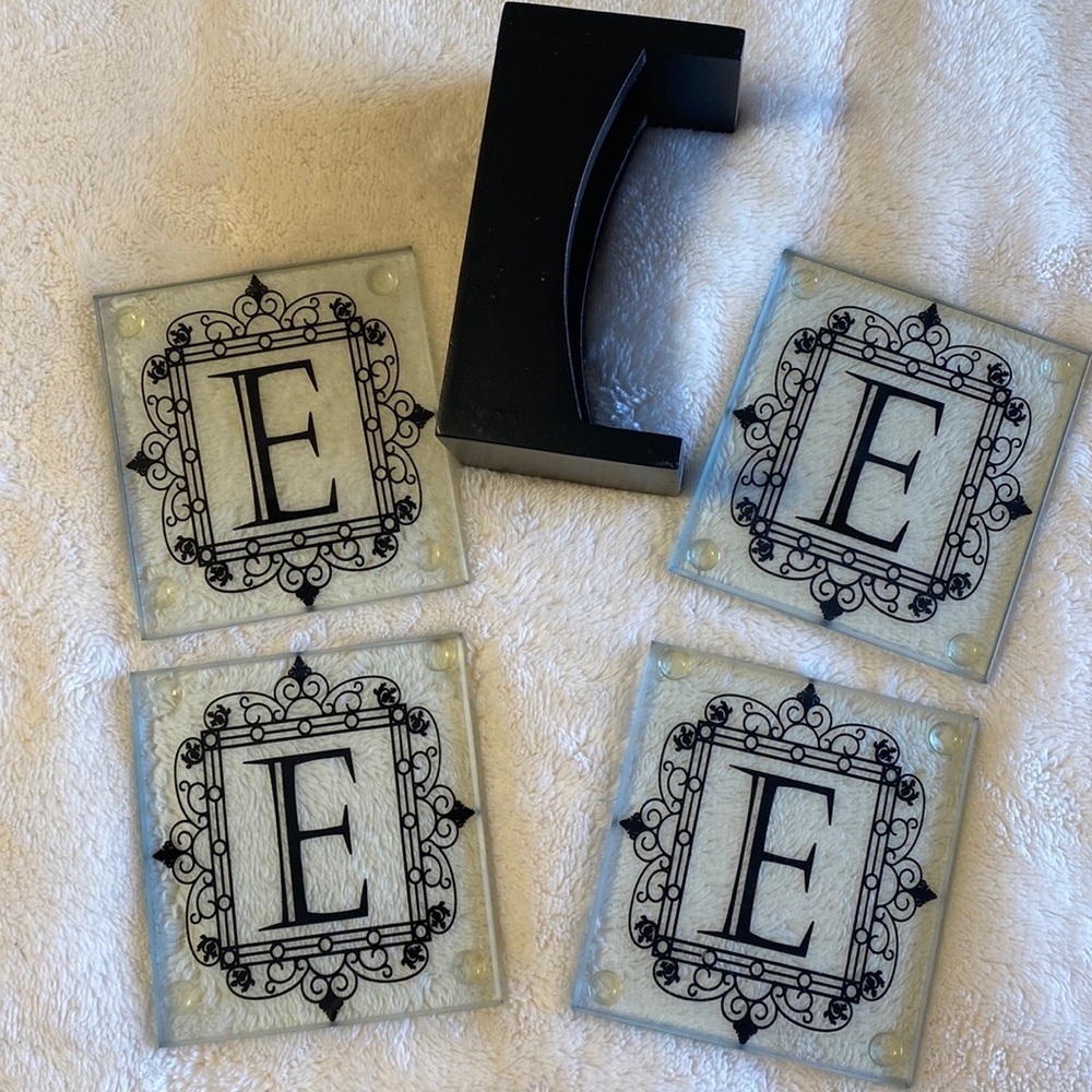 “E” monogrammed glass coasters.  Set of 4 with holder.